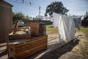 Home items in Carolyn Young's yard on Oct. 26, 2023. Planada residents had to throw out many of their possessions after their homes flooded earlier in the year during torrential rain storms. Oct. 26 2023