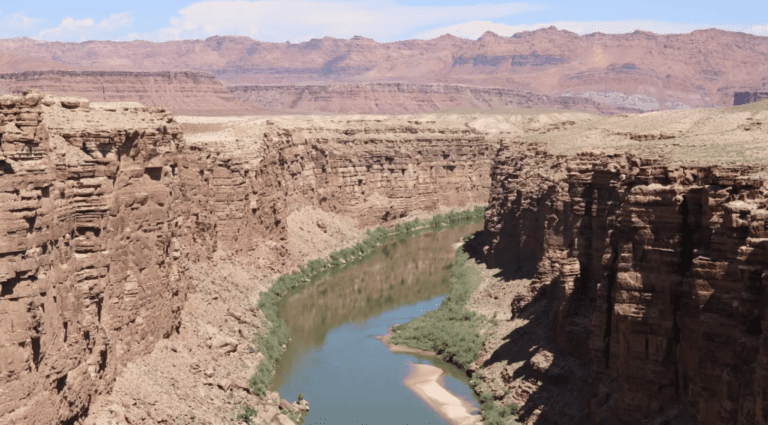A scenic overview of the Colorado River from the Navajo Bridge near Jacob Lake